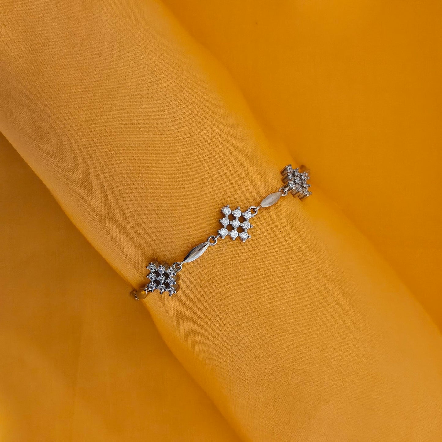 Grid Patterned 9 stone with leaf design bracelet
