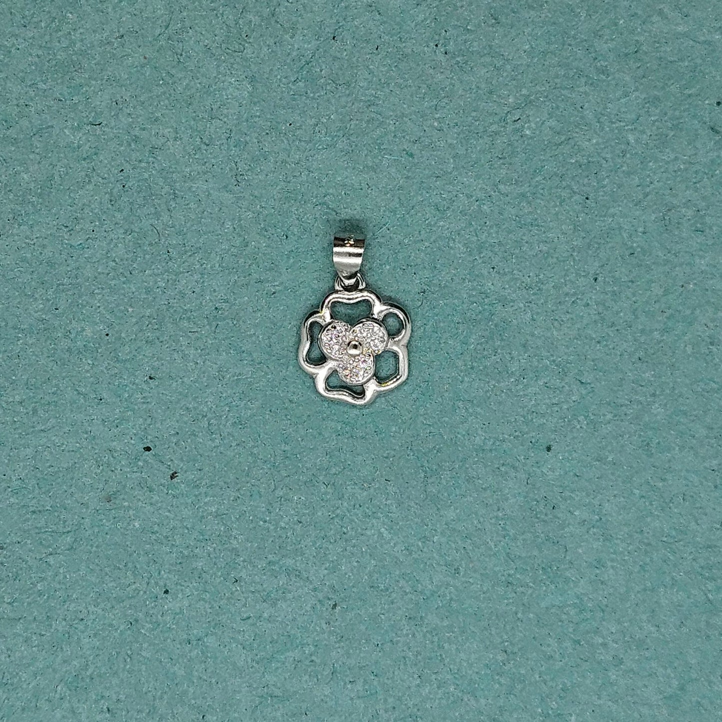 clover pendant with concentric petalled flower