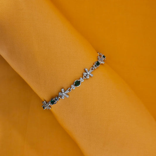 flower motif and green stone bracelet